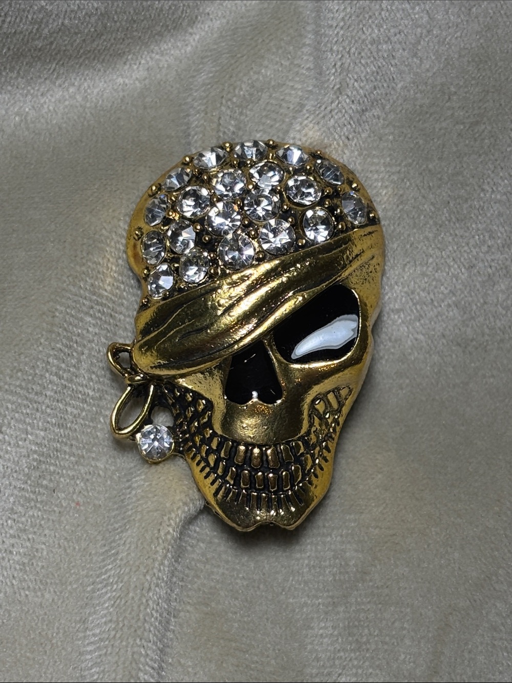 Gold Toned Skull Pirate Brooch with Clear Crystals